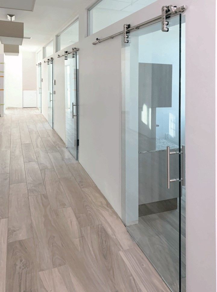 Glass commercial office doors. Sliding glass office doors.